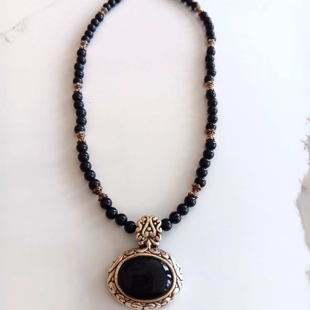 Black Beaded Necklace with Oval Pendant and Silver Setting